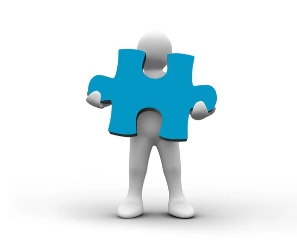 White character holding a blue jigsaw piece — Stock Photo, Image