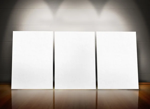 Three posters standing in line — Stock Photo, Image