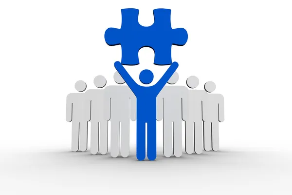 Leader holding blue jigsaw piece next to line of human forms — Stock Photo, Image