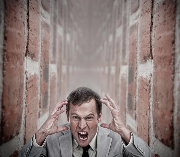 Angry businessman in a dead end — Stock Photo, Image