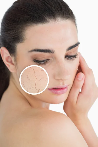Woman rubbing her skin with close up of her wrinkles — Stock Photo, Image