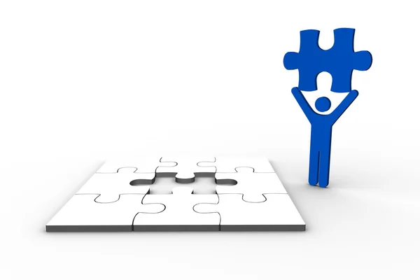 Blue human figure holding jigsaw piece — Stock Photo, Image