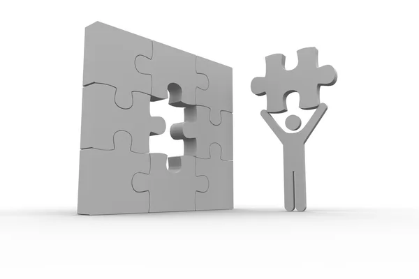 White human representation holding the missing jigsaw piece — Stock Photo, Image