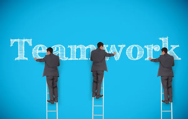 Multiple image of businessman writing teamwork — Stock Photo, Image