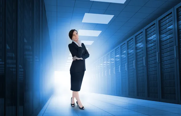 Businesswoman standing in data center — Stock Photo, Image