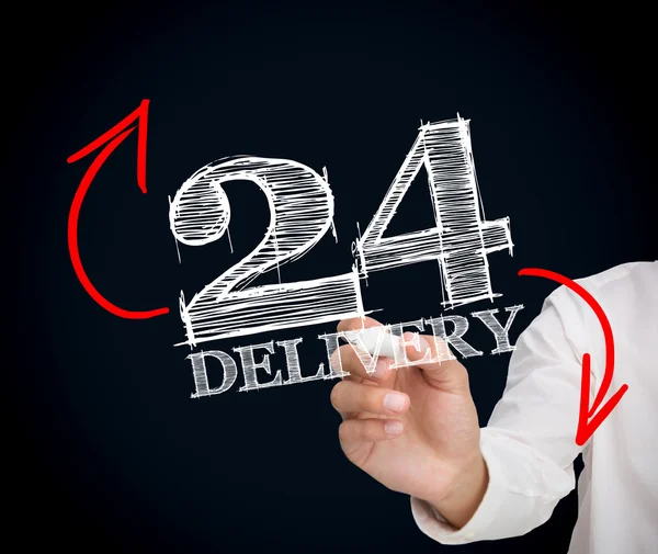 Businesswoman writing 24 delivery — Stock Photo, Image