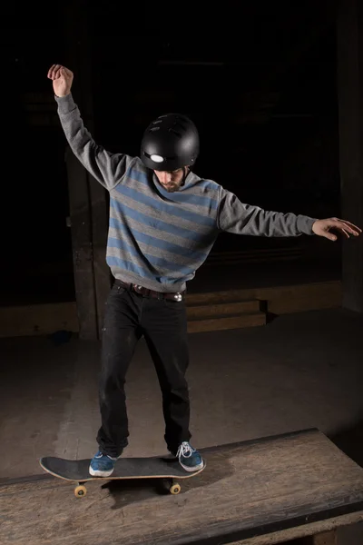 Skater doing manual trick on manual pad — Stock Photo, Image