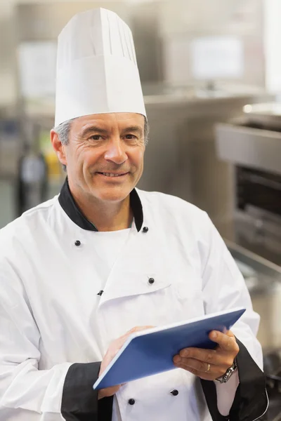 Chef using digital tablet — Stock Photo, Image