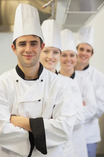 Chefs in line smiling — Stock Photo, Image