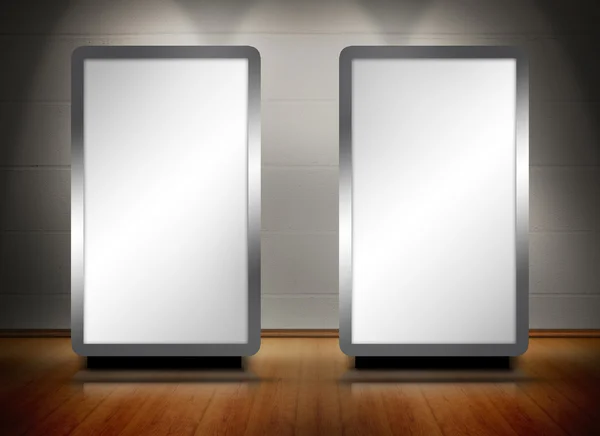 Two blank screens standing on wooden floor — Stock Photo, Image