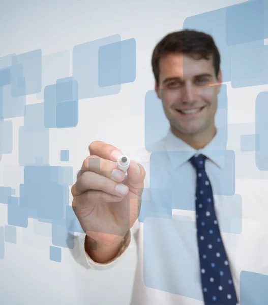 Smiling businessman about to write something — Stock Photo, Image