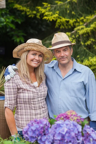 Husband and wife in the garden — Stock Photo, Image