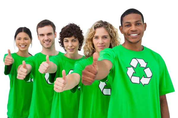 Smiling group of environmental activists giving thumbs up — Stock Photo, Image