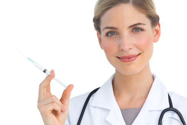 Smiling nurse with syringe — Stock Photo, Image