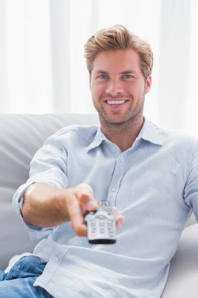 Handsome man carrying donation box with food — Stock Photo, Image