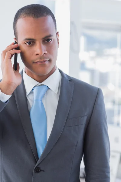 Serious businessman on a call — Stock Photo, Image