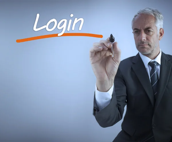 Uomo d'affari che scrive la parola login — Foto Stock