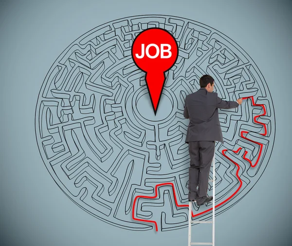 Businessman trying to find a job in a maze — Stock Photo, Image