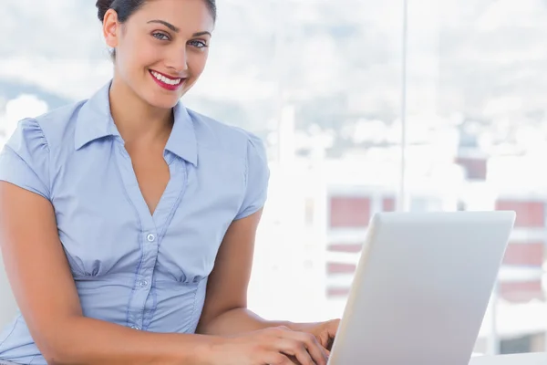 Attractive businesswoman working on her laptop — Stock Photo, Image