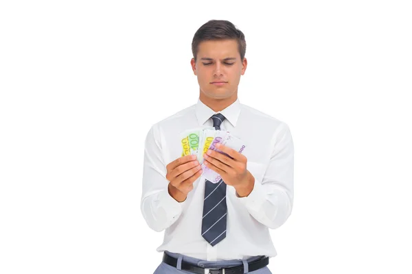 Businessman counting money — Stock Photo, Image