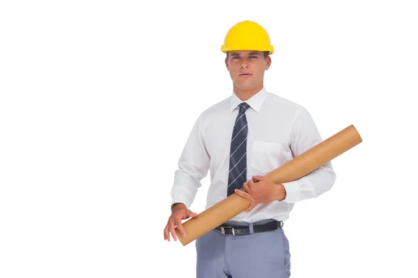 Architect holding a rolled up blueprint — Stock Photo, Image