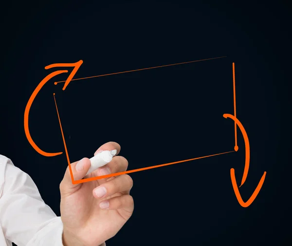 Businessman drawing orange rectangle — Stock Photo, Image