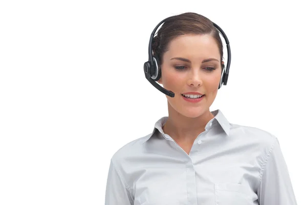 Happy call centre agent wearing headset — Stock Photo, Image