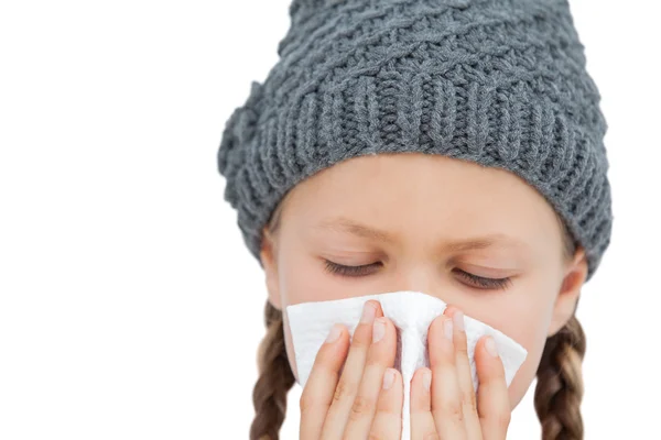 Sick little girl with an handkerchief — Stock Photo, Image