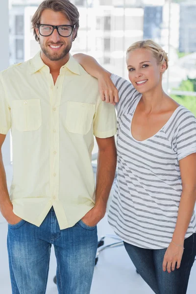 Pretty designer leaning on the colleagues shoulder — Stock Photo, Image