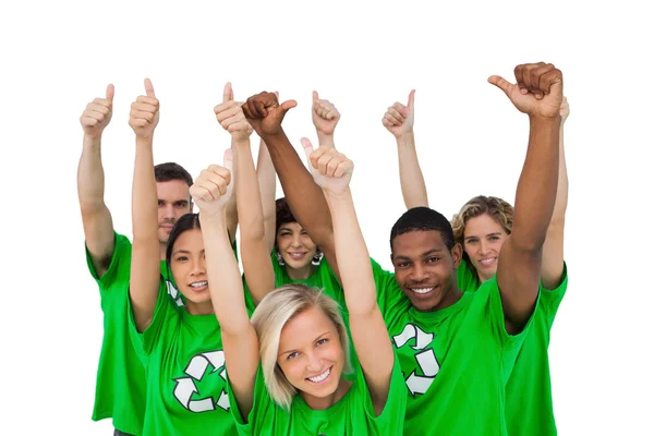 Grupo alegre de ambiental dando polegares para cima — Fotografia de Stock