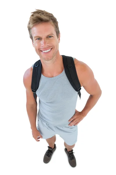 Attractive man in sportswear with hands on hips — Stock Photo, Image