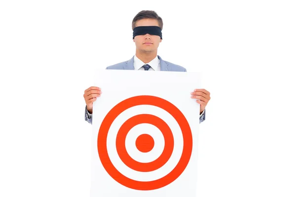 Man with blindfolded and a target — Stock Photo, Image