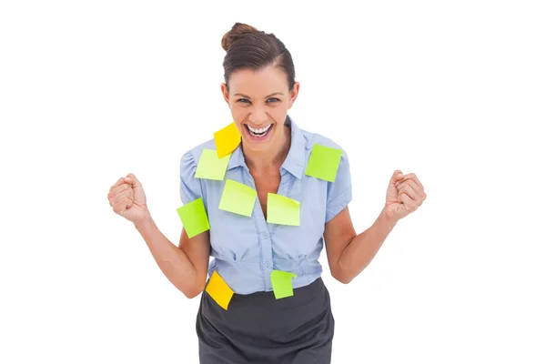 Businesswoman triumphing with adhesive notes — Stock Photo, Image