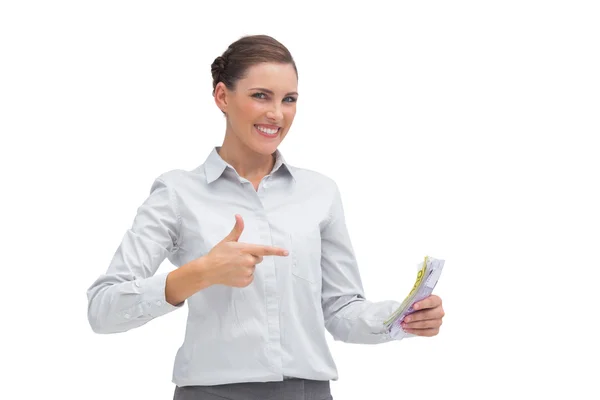 Happy businesswoman with money in her hand — Stock Photo, Image