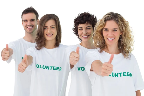 Grupp av frivilliga som ger tummen upp — Stockfoto