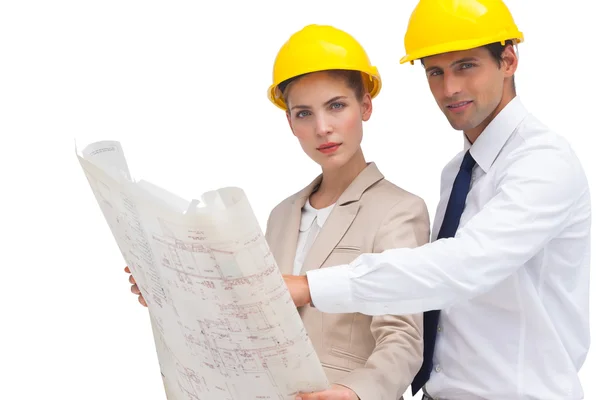 Serious architects looking at the camera — Stock Photo, Image