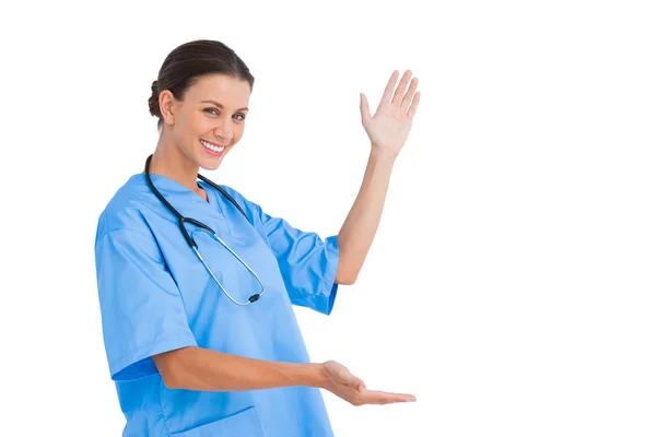 Surgeon holding up hands in presentation — Stock Photo, Image