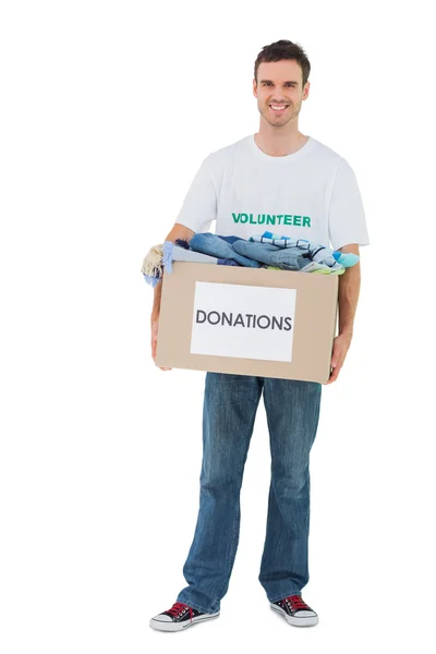 Smiling man holding donation box — Stock Photo, Image