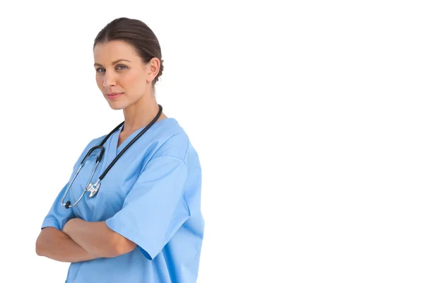 Surgeon with arms crossed smiling — Stock Photo, Image