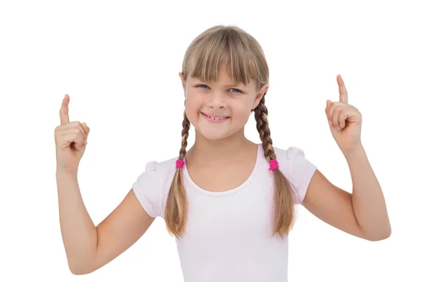 Happy young girl pointing up — Stock Photo, Image