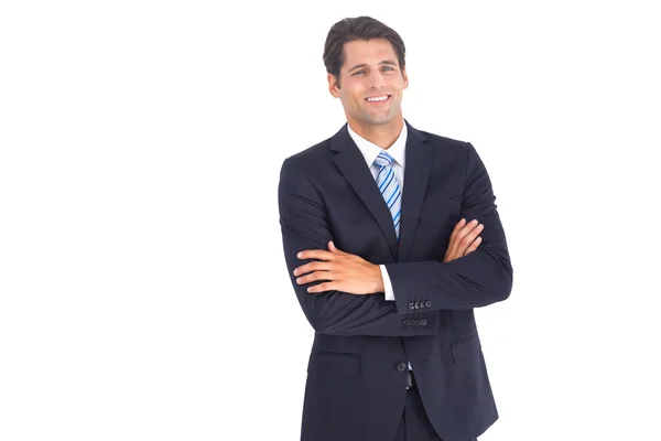 Sonriente hombre de negocios mirando a la cámara — Foto de Stock