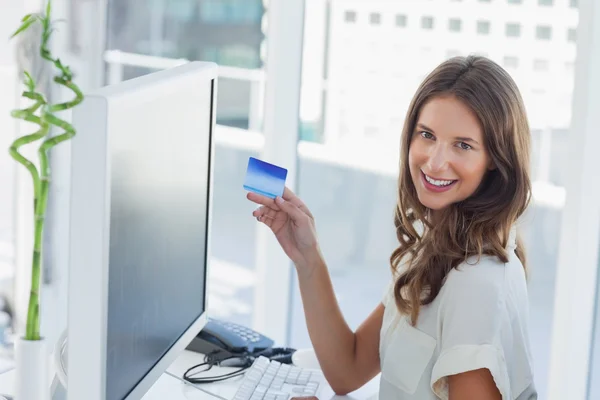 Cheerful brunette designer purchasing online — Stock Photo, Image