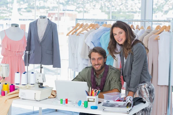 Two fashion designers looking at camera — Stock Photo, Image