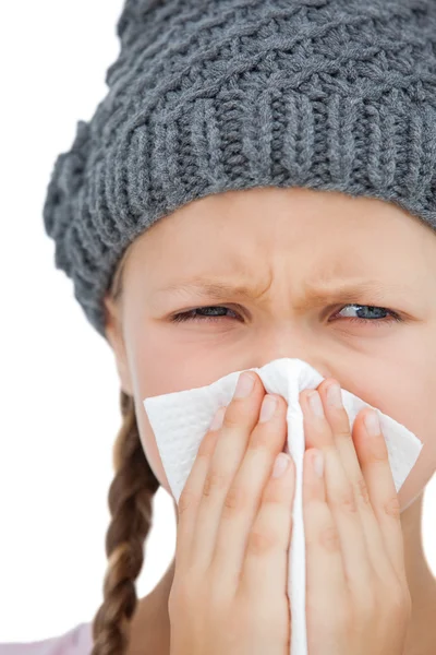 Sick little girl with an handkerchief and a grey hat — Stock Photo, Image