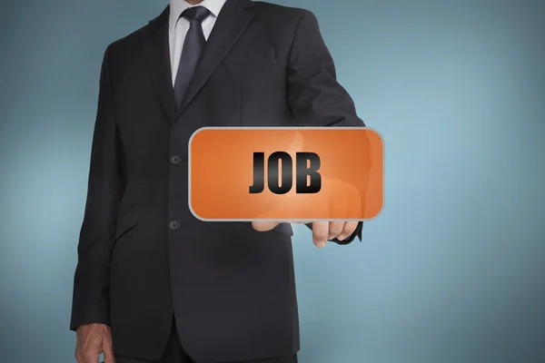 Businessman selecting orange tag with job — Stock Photo, Image