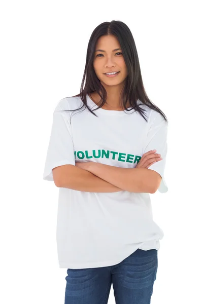 Voluntário atraente com braços cruzados — Fotografia de Stock