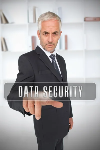 Businessman selecting the term data security — Stock Photo, Image