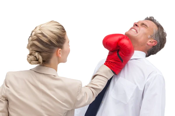 Businessman receiving uppercut — Stock Photo, Image