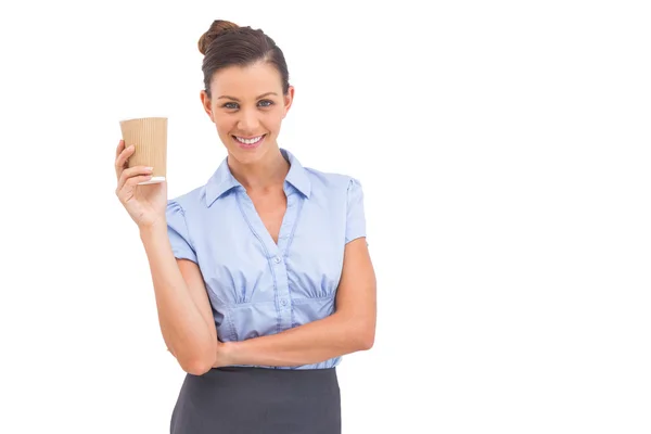 Attractive businesswoman holding coffee cup — Stock Photo, Image