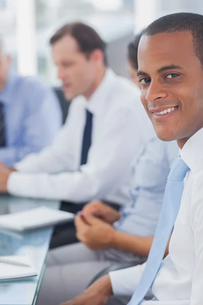 Happy businessman posing in the meeting room — Stock Photo, Image